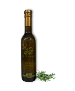 A 375ml bottle of Wild Rosemary Olive Oil with rosemary leaves.