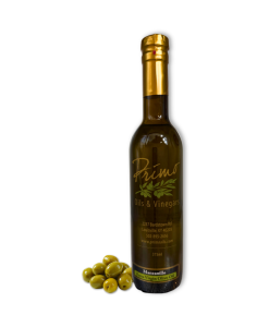 A 375ml bottle of Manzanillo Extra Virgin Olive Oil with green olives grown from Spain.