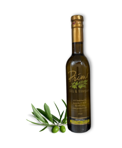 A 375ml bottle of Chiquitita Extra Virgin Olive Oil with green olives grown in Portugal.