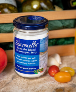 A jar of Seasonello Sea Salt with tomato, garlic, herbs and pepper on side
