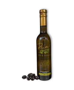 A 375ml bottle of Frantoio Extra Virgin Olive Oil with purple olives grown from Chile.